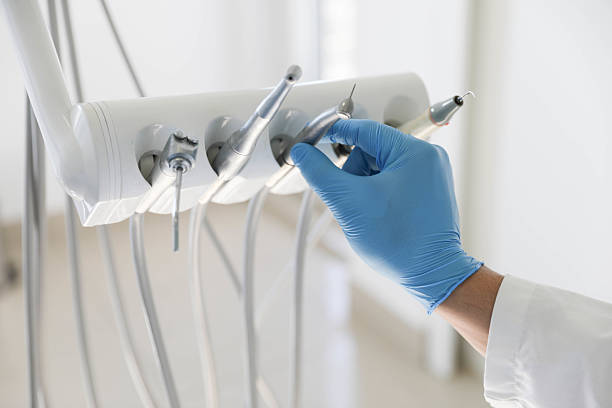 Professional Invisalign Clear Aligners technician working in Morrisonville, NY
